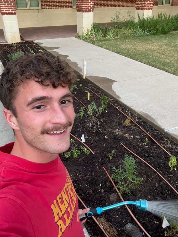 selfie with gardening beds